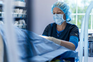 Vet preparing a pet for surgery.
