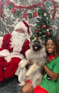 pup with santa claus and his elf